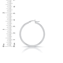 Load image into Gallery viewer, 10k White Gold 15mm x 2.5mm High Polish Round Tube Hoop Earrings