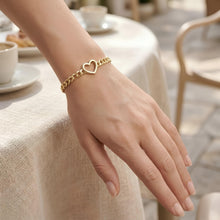 Load image into Gallery viewer, 14k Yellow Gold 10mm Open Heart Charm 3.4mm Lite Curb Link Bracelet, 7 Inch