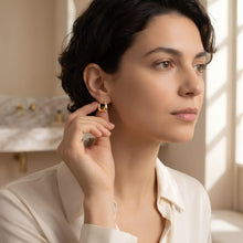 Load image into Gallery viewer, 10k Yellow Gold 17.3mm Polished Swirl Hoop Earrings
