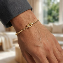 Load image into Gallery viewer, Italian 14k Yellow Gold 9.5mm Puffed Wire Love Knot Bangle Bracelet, 7 Inch