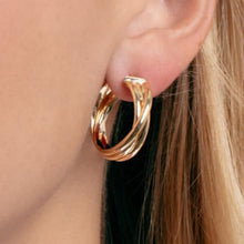 Load image into Gallery viewer, 14k Yellow Gold 29.6mm x 5.6mm or 25.6mm x 4.9mm Interlocking Trinity Hoop Earrings
