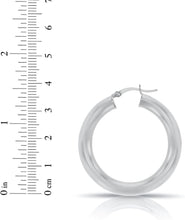 Load image into Gallery viewer, 10k White Gold 25mm x 5mm High Polish Round Tube Hoop Earrings
