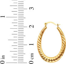Load image into Gallery viewer, 10k Yellow Gold 23mm Graduated Oval Twist Hoop Earrings
