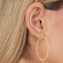 Load image into Gallery viewer, 14k Yellow Gold or White Gold 40mm Large Oval Hoop Earrings
