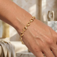 Load image into Gallery viewer, 14k Yellow Gold 6mm Alternating Polished Oval &amp; Faceted Infinity Link Bracelet, 7.5 Inch
