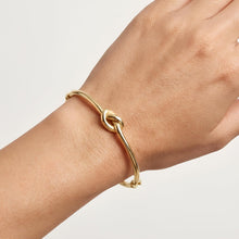 Load image into Gallery viewer, 14k Yellow Gold 9.5mm Polished Puffed Wire Love Knot Bangle Bracelet, 7 Inch
