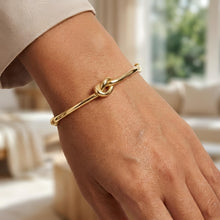 Load image into Gallery viewer, Italian 14k Yellow Gold 9.5mm Puffed Wire Love Knot Bangle Bracelet, 7 Inch
