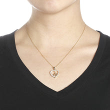 Load image into Gallery viewer, 10k Yellow Gold Double Heart &quot;Mother Holding Child&quot; CZ Pendant Necklace
