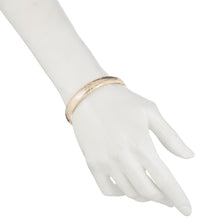 Load image into Gallery viewer, 10k Yellow Gold bangle bracelet Flexible Round with Leaves Bow Tie Design (0.4”)
